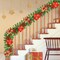 9Ft Pre-lit Christmas Garland with LED Lights Battery Operated, Holiday Decoration Stairs Wall Mantle Door Indoor Outdoor, Decorated with Red Flower, Balls, Berries, Snowy Pine, Christmas Collection